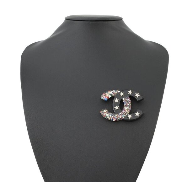 CHANEL CC Logo Star Brooch Plastic/Metal/Rhinestone Black/Multicolor - Picture 1 of 9